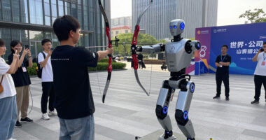 Robot Archer Lights Up 'Zhixin' As 2Nd World Humanoid Robot Games Open In Beijing